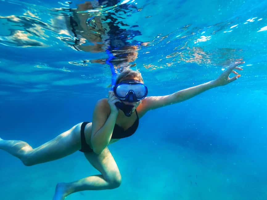 Ibiza: Snorkeling and SUP Paddle, Beach and Cave Boat Tour - Cruising Ibiza’s west coast before the first stop