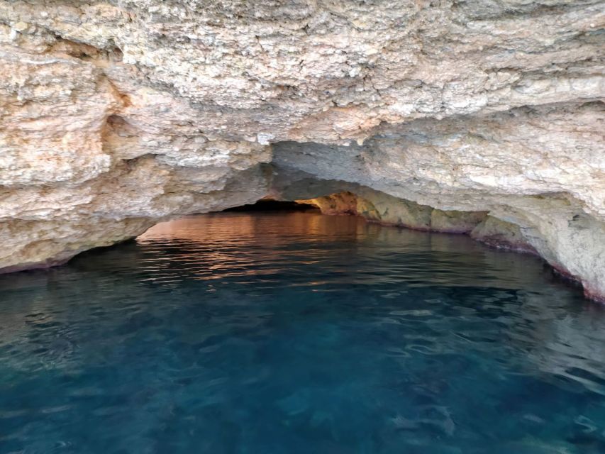 Ibiza: Snorkeling and SUP Paddle, Beach and Cave Boat Tour - Drinks, crew service, and the social atmosphere