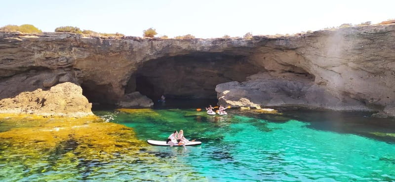 Ibiza: Snorkeling, Sunset Beach and Cave Boat Trip - The pirate cave and coastal stories