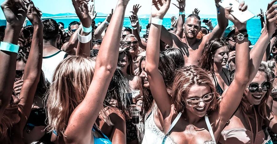 Ibiza: Sunset Boat Party at Ibiza Boat Club with Open Bar - The first hour: coastline, drinks, and the DJ