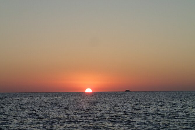 Ibiza Sunset Snorkeling Beach and Cave Tour - Drinks and music shape the mood