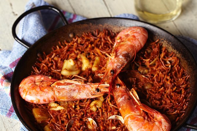 Interactive Paella & Market: Bottomless Wine & Rambla Views - Dietary needs, children, and who should choose it