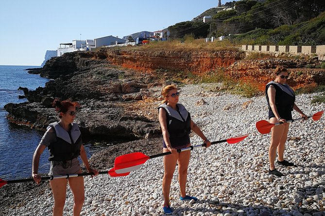 Kayak Dénia "Cova Tallada" + Snorkeling + Speleology - Inside the carved cave with a lantern