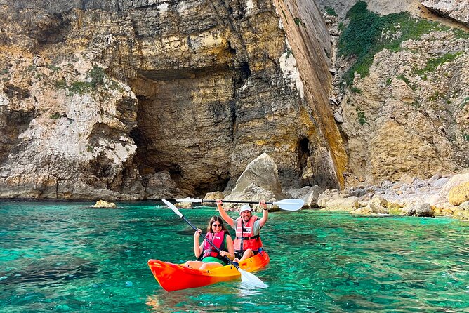 Kayak Paradise: Cala Portixol Snorkel, Cave & Cliff Jumping Tour - Is the activity suitable for children and beginners?