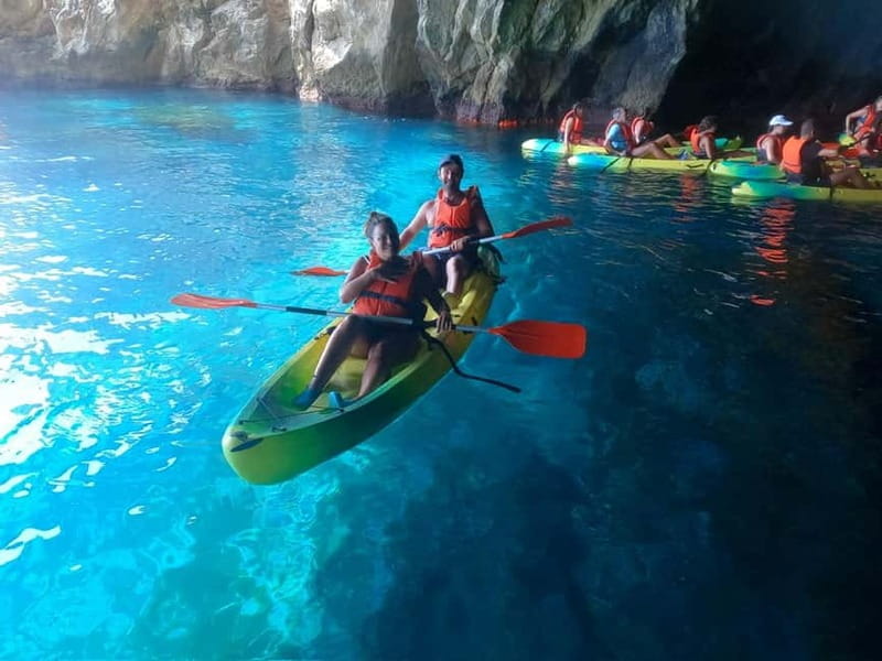 La Herradura: Kayak & Snorkel Tour to Cerro Gordo Reserve - Paddling beneath the Maro-Cerro Gordo cliffs
