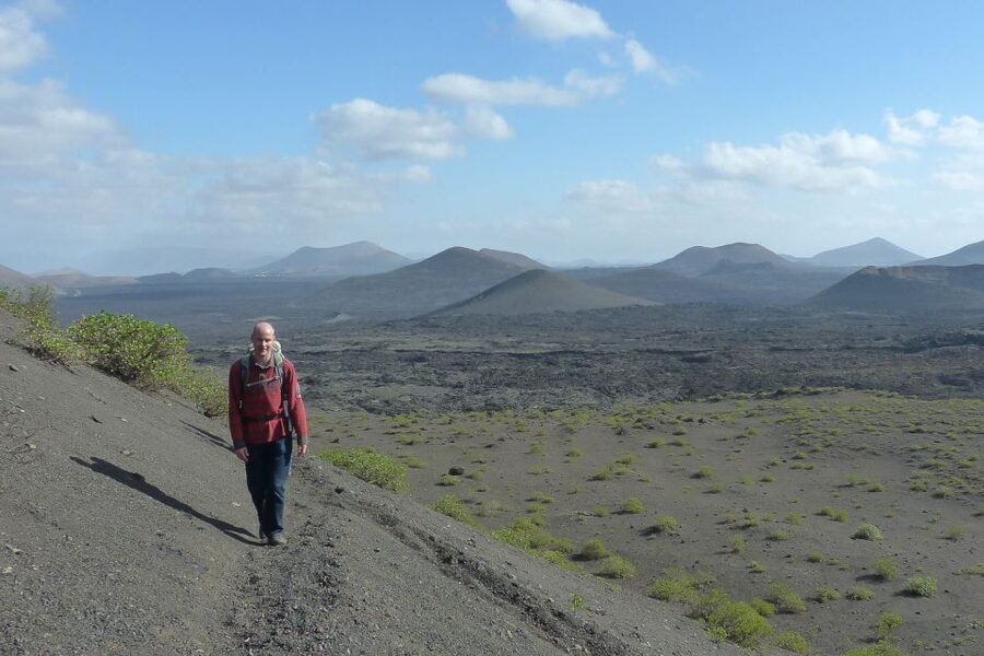 Lanzarote: Guided Volcano Hike with Transfers - Crossing the hardened lava fields