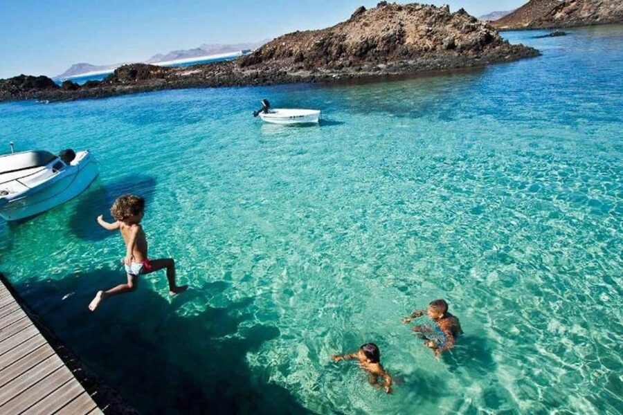 Lanzarote: Lobos Island Half-Day Dolphin Watching Trip - Swimming, snorkeling, and volcanic paths