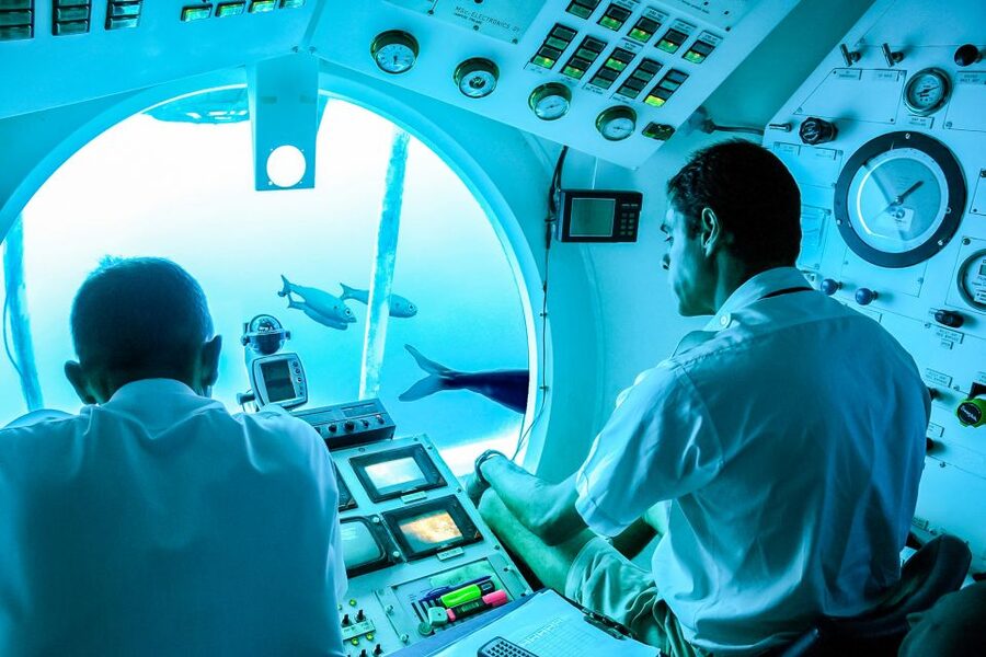 Lanzarote: Real Submarine Dive with Hotel Pickup - Hotel pickup, departure times, and the Puerto Calero setting