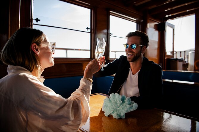Live Music & Sunset Wooden Boat in Barcelona - The onboard bar and extra costs
