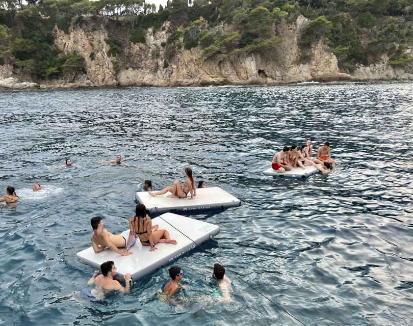 Lloret de Mar: Sunset Catamaran Cruise with DJ and Drinks - Drinks, music, and the party atmosphere