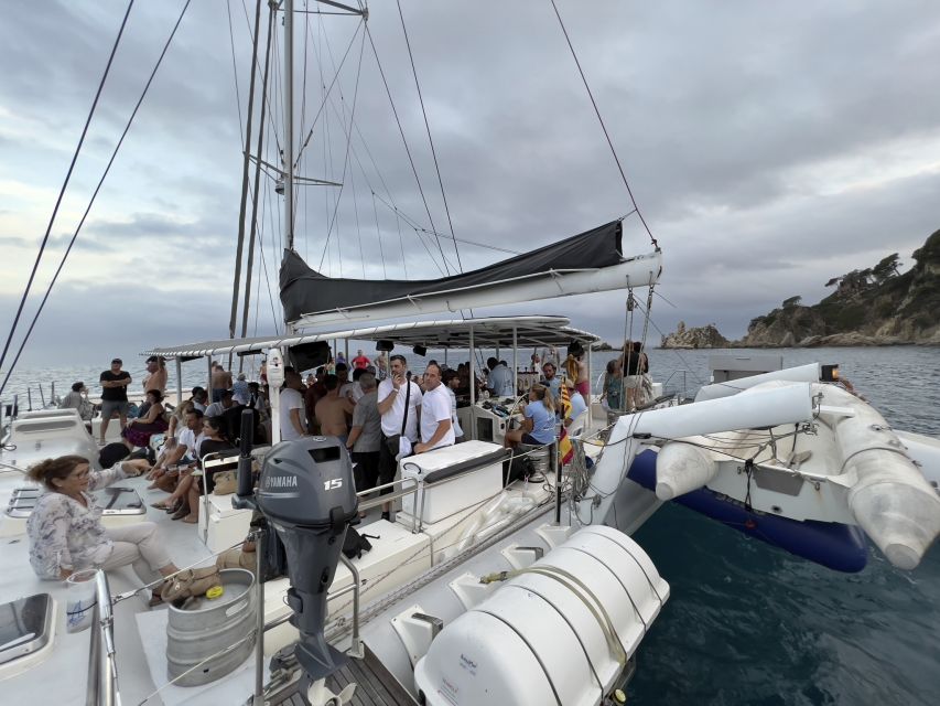 Lloret de Mar: Sunset Catamaran Cruise with DJ and Drinks - What the $41 price really covers