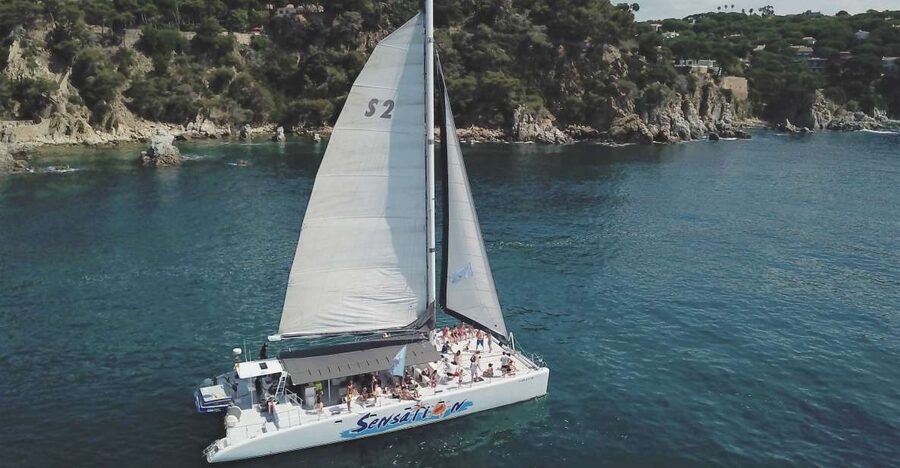 Lloret de Mar: Sunset Catamaran Cruise with DJ and Drinks - Finding the Catamaran Sensation ticket box