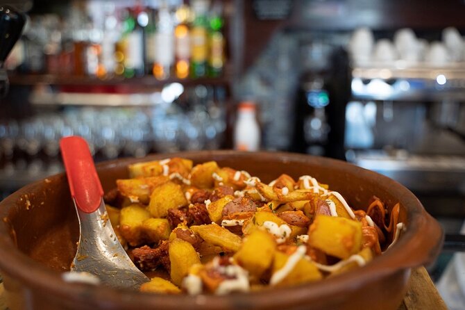 Madrid by Night: Tapas Crawl, Local Drinks & Hidden Gems - The guides make the experience more than a meal