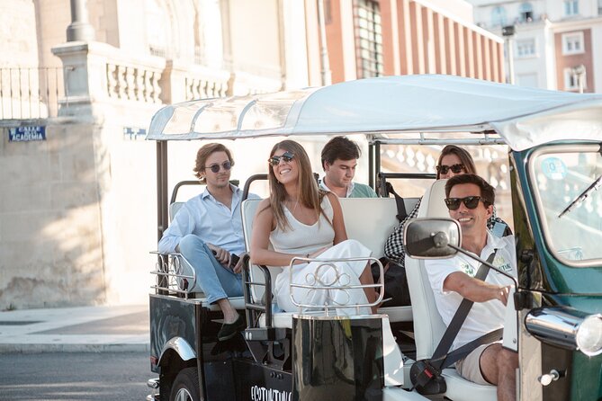Madrid Express Tour with Local Guide in Eco Tuk Tuk Private - Atocha Station and Madrid’s changing city