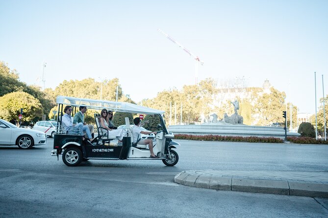 Madrid Express Tour with Local Guide in Eco Tuk Tuk Private - Mercado de San Miguel: Madrid’s food stop