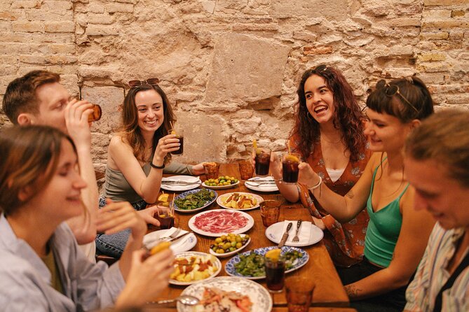 Madrid Food Walking Tour with Tapas and Vermouth - Guide quality, group size, and pace