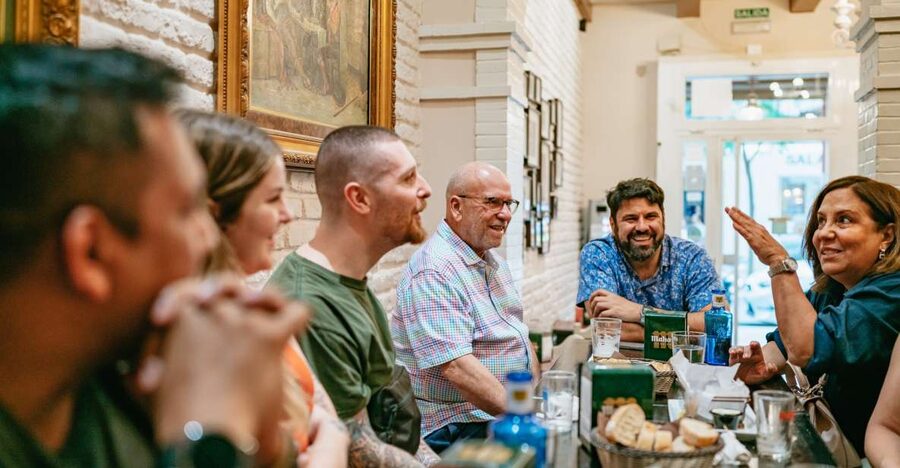 Madrid: Guided Tapas Tour with Tastings and Drinks - The neighborhood bar: food among local regulars