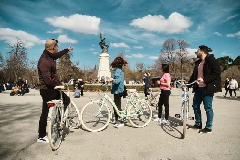 Madrid: Highlights Guided Vintage Bike Tour and Tapas Option - Puerta de Alcalá and Gran Vía before returning