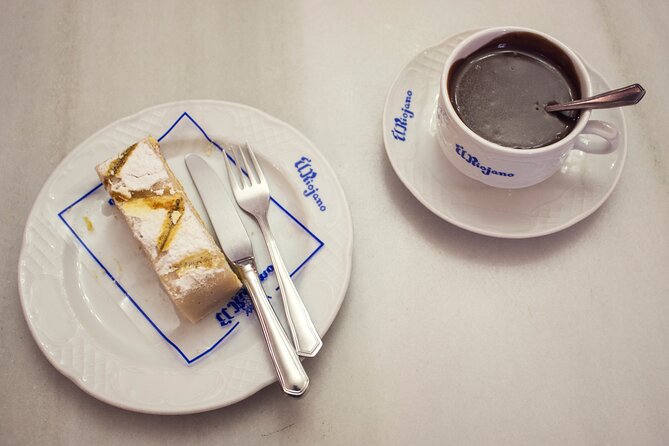 Madrid Historic Centre Food Tour with Authentic Tapas & Wines - The 180-year-old deli and Spanish pantry staples