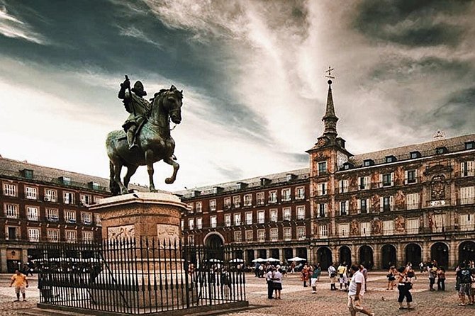 Madrid Old City Guided Exclusive Guided Walking Tour - Real Casa de Postas and the Twelve Grapes at Puerta del Sol