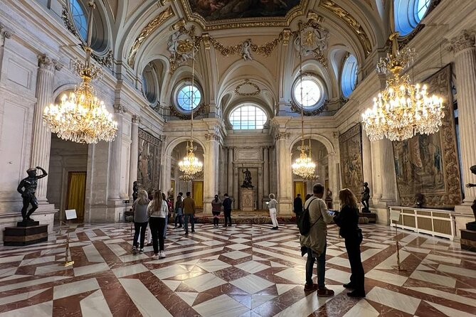 Madrid: Royal Palace Guided Tour with Skip the Line Ticket - The short walk and skip-the-line entry