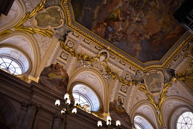 Madrid: Royal Palace Guided Tour with Skip the Line Ticket - Inside a palace built for spectacle