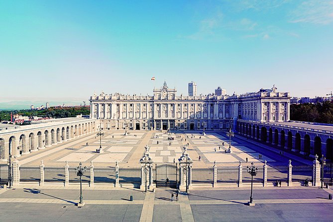 Madrid Sightseeing Tour with Royal Palace Skip the Line Ticket - Gran Vía, Puerta de Alcalá, and Madrid’s modern face