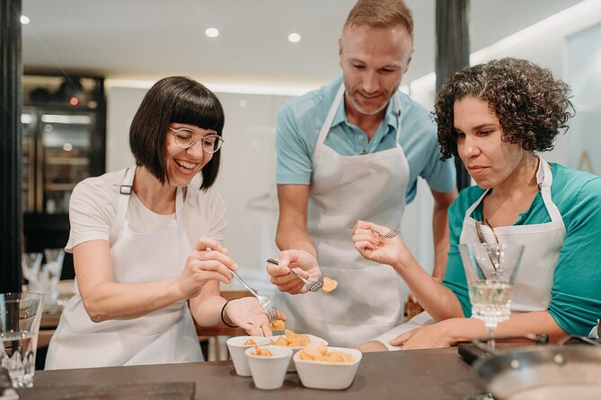 Madrid Tapas & Paella Cooking Experience with Local Market Visit - The best parts at a glance