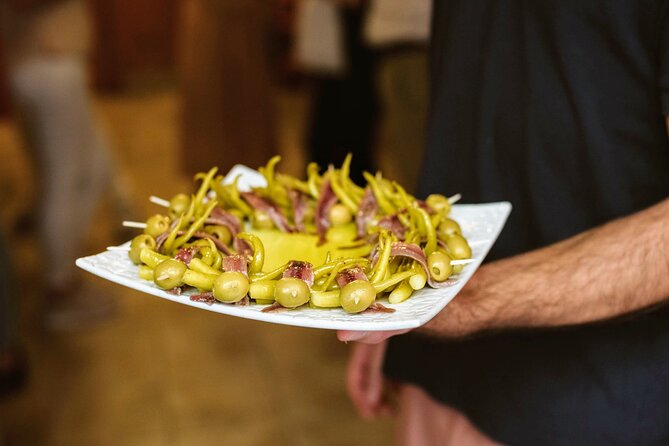 Madrid Tapas & Paella Cooking Experience with Local Market Visit - Paella, tapas, and the shared-table payoff