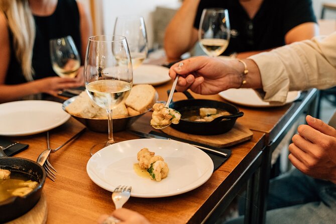 Madrid Tapas & Wine Tour with Rooftop Views and Local Guide - What the $113.66 Price Covers