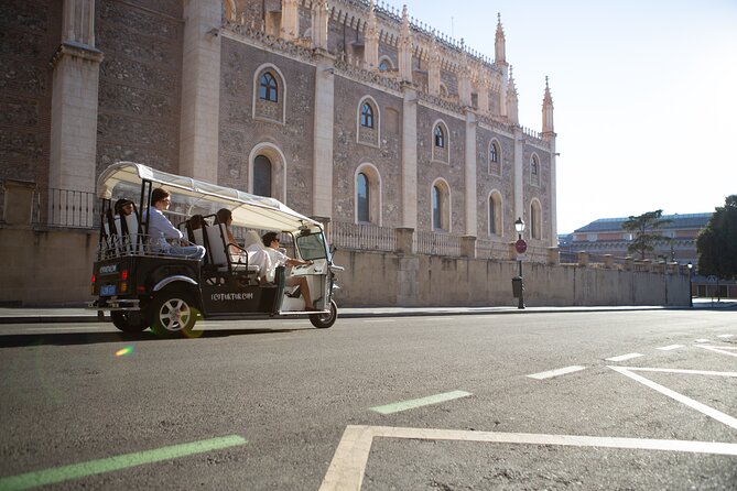 Madrid Welcome Tour with Local Guide in Eco Tuk Tuk Private - Puerta de Alcalá, Cibeles, and Neptune