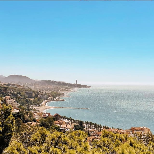 Malaga: Castle Hill and Fisherman Village E-Bike Tour - The beach promenade and Miramar Palace