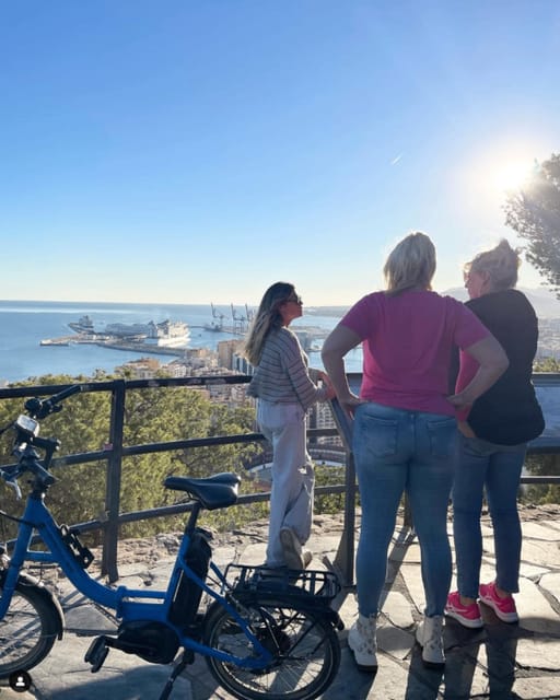 Malaga: Castle Hill and Fisherman Village E-Bike Tour - Muelle Uno and the return ride