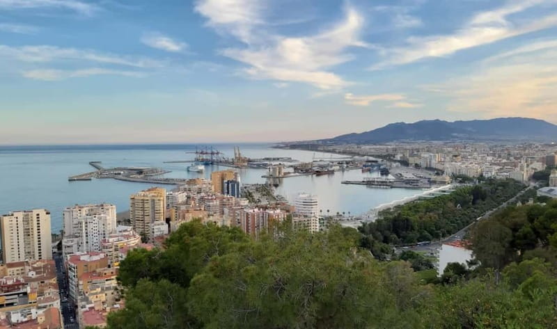 Malaga: Castle Hill and Fisherman Village E-Bike Tour - Starting through Malaga’s center