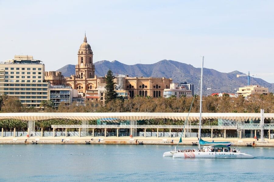 Malaga: Catamaran Sailing Cruise with Swimming & Optional DJ - Leaving Malaga’s pier for a sea-level view