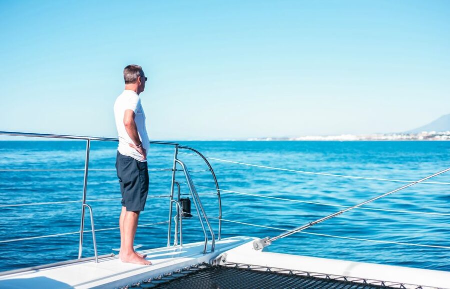 Málaga: Scenic Catamaran Cruise - Swimming, sunbathing, and the important catch