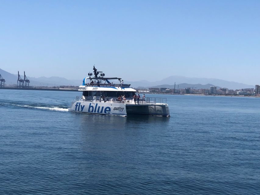 Málaga: Sunset Catamaran Trip - Music, bar service, and the onboard atmosphere