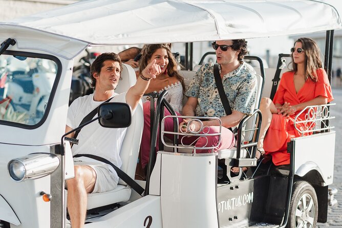 Malaga Welcome Tour with Local Guide in Eco Tuk Tuk Private - La Malagueta Beach and the eastern coast