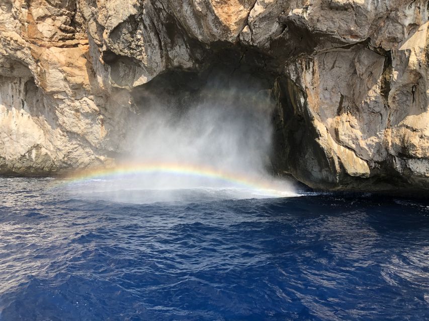 Mallorca : Blue Cave Boat Tour with Snorkeling - Entering the Blue Cave from the water