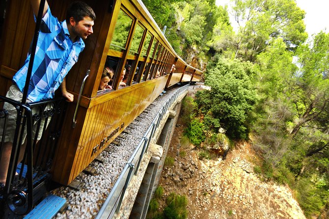 Mallorca in One Day Sightseeing Tour with Boat Ride and Vintage Train - Crossing the Serra de Tramuntana by coach