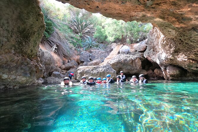 Mallorca: Kayaking, Sea Cave, Cliff Jumping & Snorkel Tour - Coastal walking and the optional cliff jump