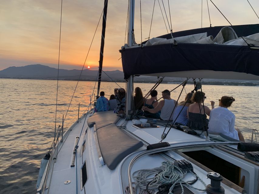 Marbella: Sunset Sailing Trip with Drinks and Snacks - Photos, dolphins, and the limits of sunset promises