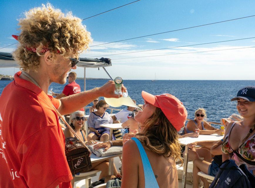 Menorca: Full-Day Boat Tour with Paella Lunch - Should you book the Fiesta boat trip?