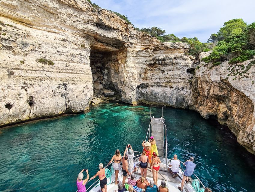 Menorca: Full-Day Boat Tour with Paella Lunch - Son Saura: a second chance to swim
