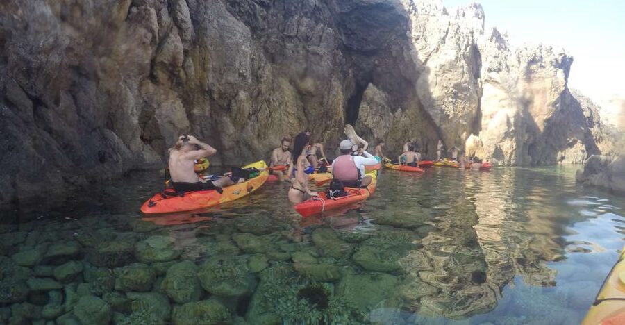 Menorca: Kayak and Marine Reserve Snorkeling Adventure - Paddling Beside La Mola de Fornells