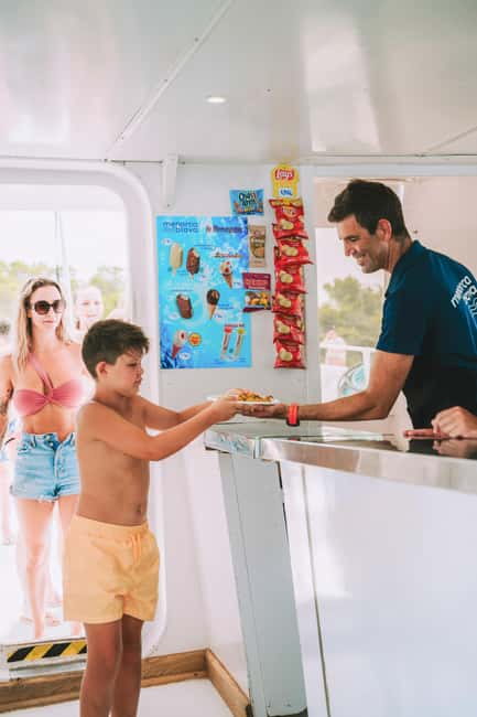 Menorca: Natural Coves and Beaches Boat Trip & Paella Lunch - Paella lunch with sangria on board