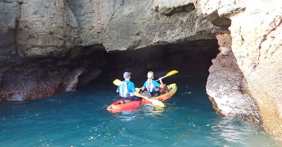 Mogán: Guided Kayak to Caves and Snorkeling Tour - White cliffs and volcanic caves