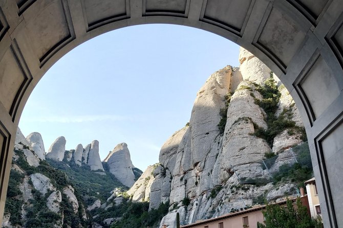 Montserrat Hiking Experience & Monastery Premium Small Group Tour - Starting on Passeig de Gracia in an eight-seat van