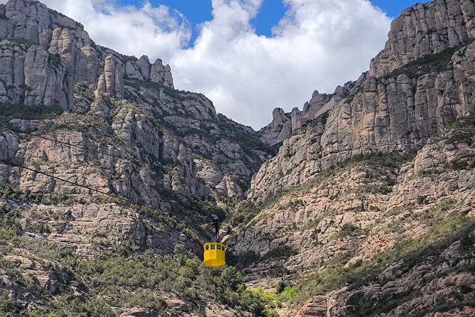 Montserrat Tour by Train with Cable Car and Cogwheel - The basilica and Black Madonna cost extra