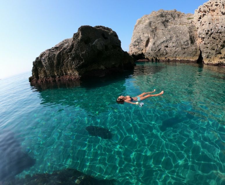 Nerja: Guided Kayak Tour Nerja Cliffs and Maro Waterfall - Small caves, rock passages, and bays from water level
